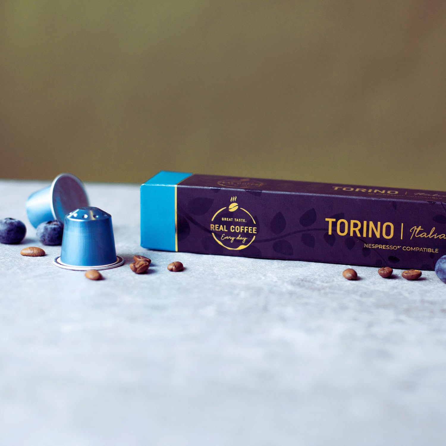 REAL COFFEE GREAT TASTE aluminum capsule close-up highlighting freshness-preserving design