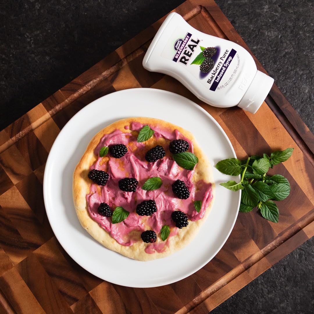 Reàl Infused Exotics drizzled over dessert adding bold blackberry flavor