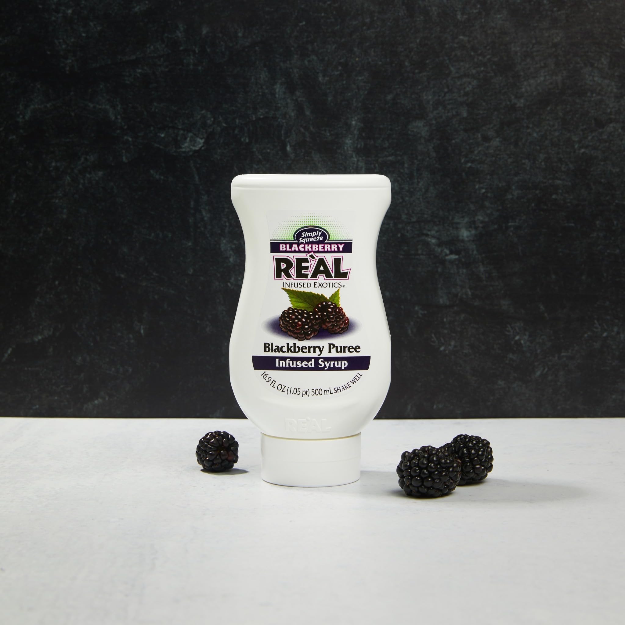 Reàl Infused Exotics wide-mouth bottle opening allowing full product access