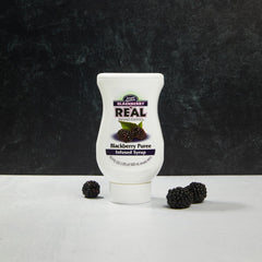 Reàl Infused Exotics wide-mouth bottle opening allowing full product access