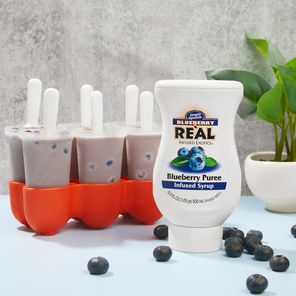 Reàl Infused Exotics bottles next to a measuring cup showing 16.9 fl oz scale and portioning benefit