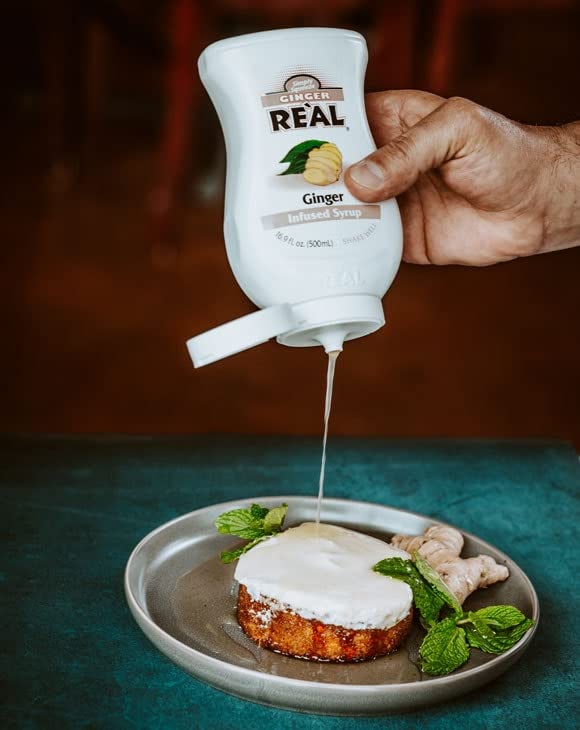 Reàl Infused Exotics bottle next to a soda can showing compact size and practical storage