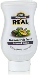 Reàl Infused Exotics bottle pouring syrup, demonstrates drip-free spout for precise mixing