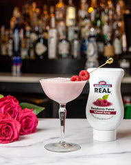 Reàl Infused Exotics raspberry drizzled over waffle, adds bright fruity flavor to breakfast