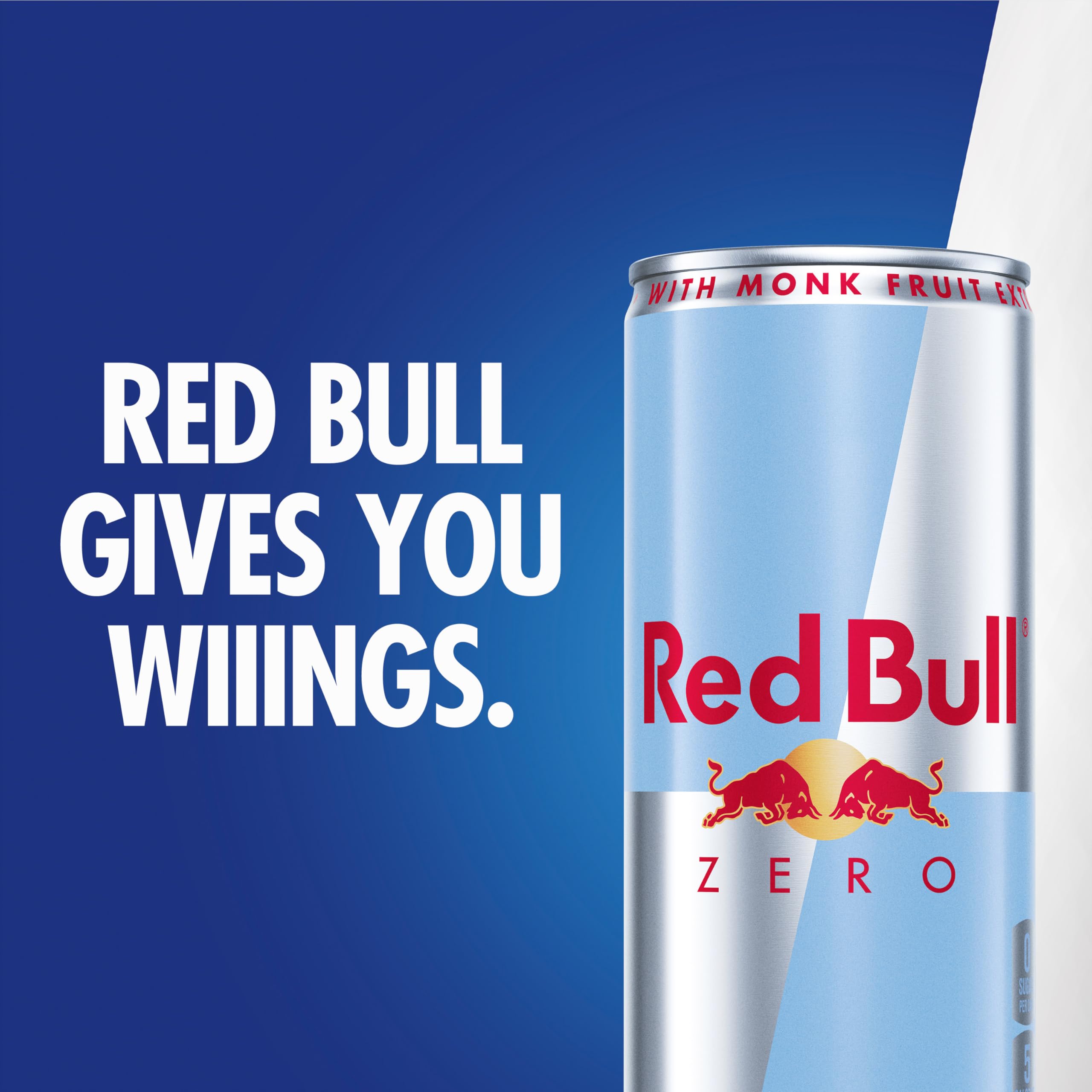 Red Bull on a desk beside laptop for focused work and alertness