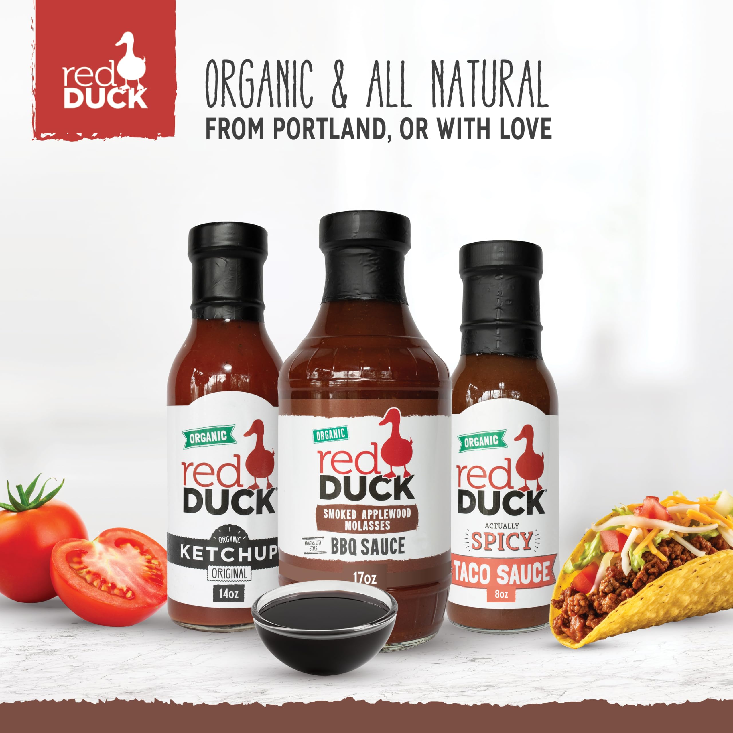 Red Duck bottle on backyard grill scene suggesting authentic BBQ flavor benefit