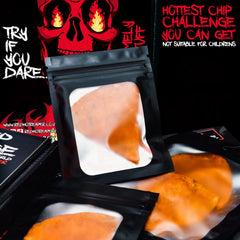 Two-pack Red Hot Reaper beside a hand for scale, illustrates single-chip challenge portioning