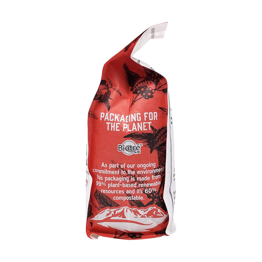 Red Rooster Coffee pour-over brew with clear cup showcasing balanced clarity and sweetness