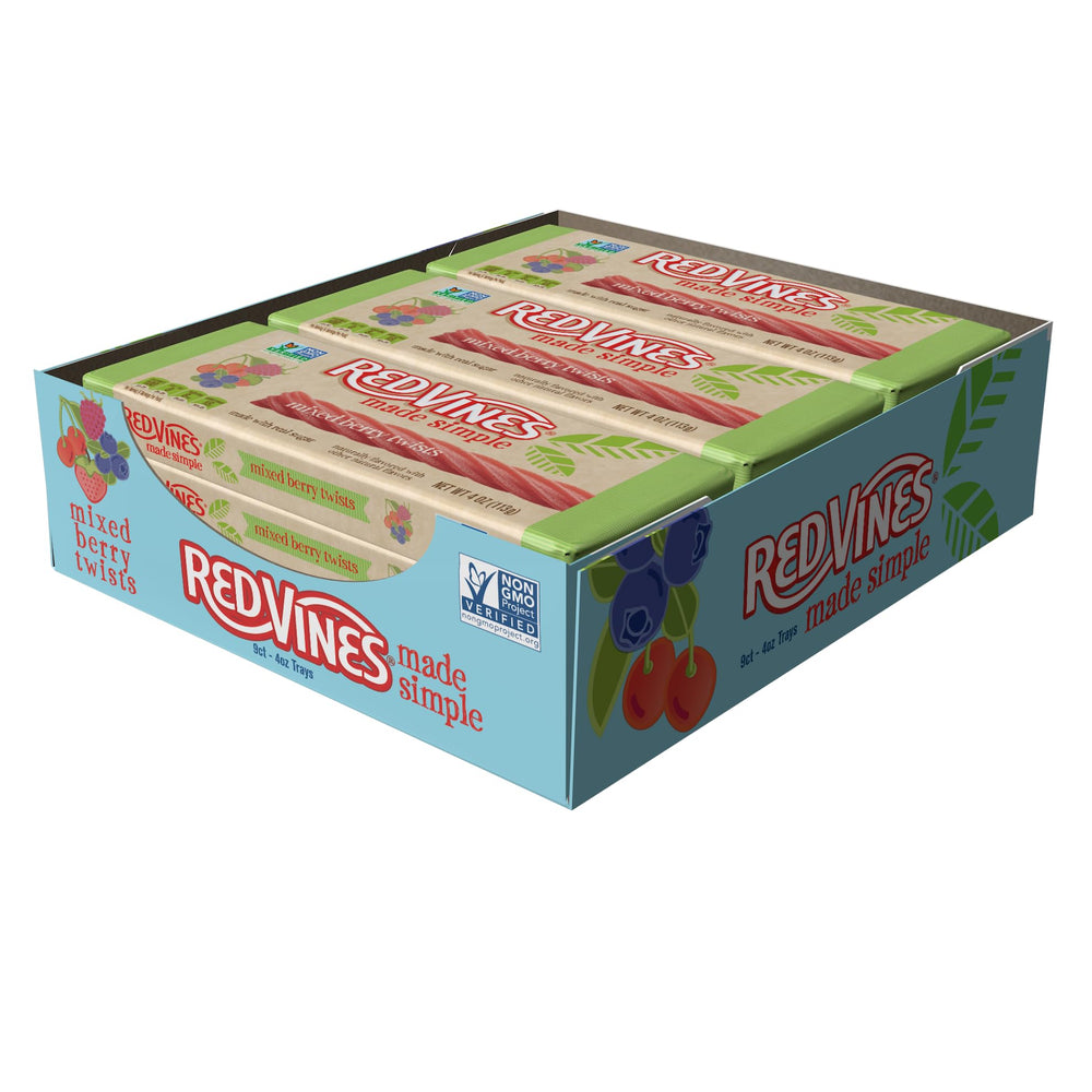 Hand holding a Red Vines tray for scale showing portable snack convenience
