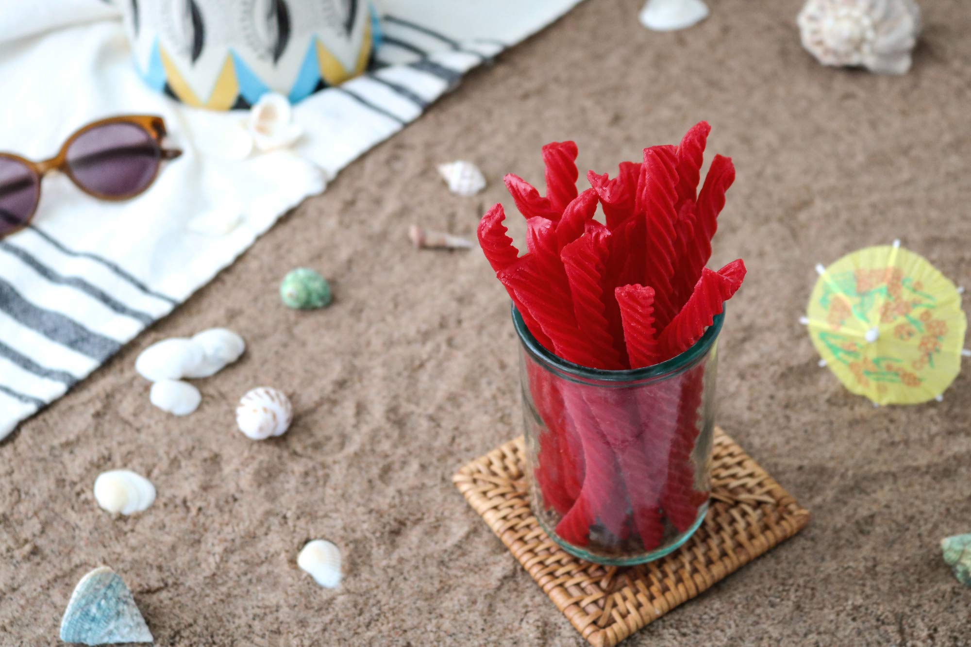 Red Vines used as dessert garnish on cupcakes adding color and flavor