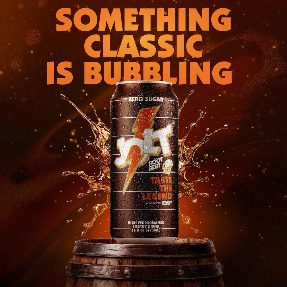 Hand holding a JOLT Root Beer can illustrating size and portable energy
