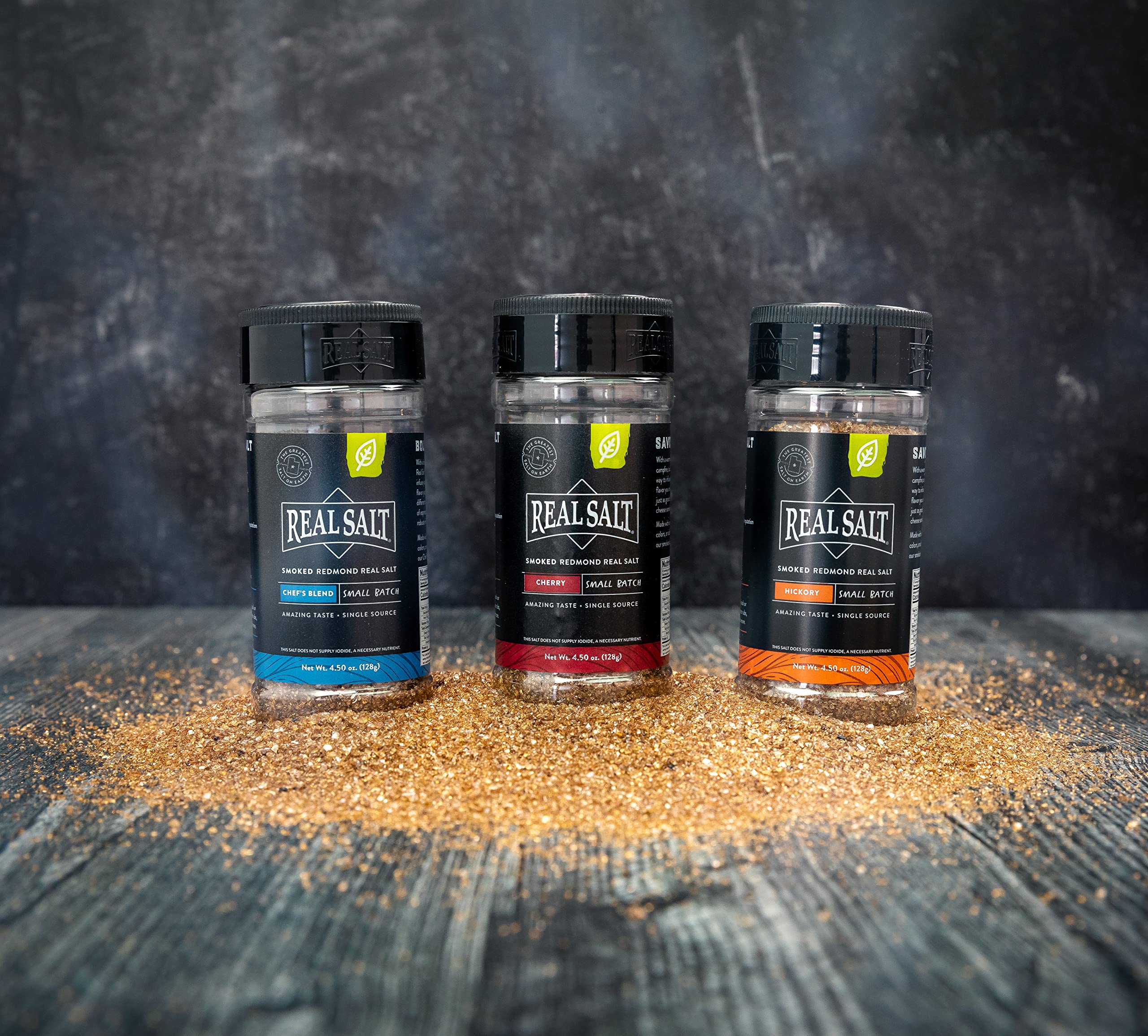 REDMOND salt sprinkled on grilled steak adding smoky finishing flavor