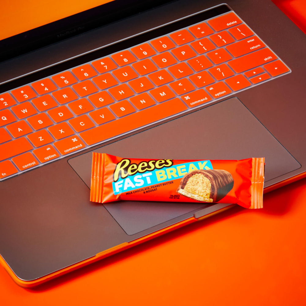 Reese's bar in hand to show size and portion control for on-the-go snacking