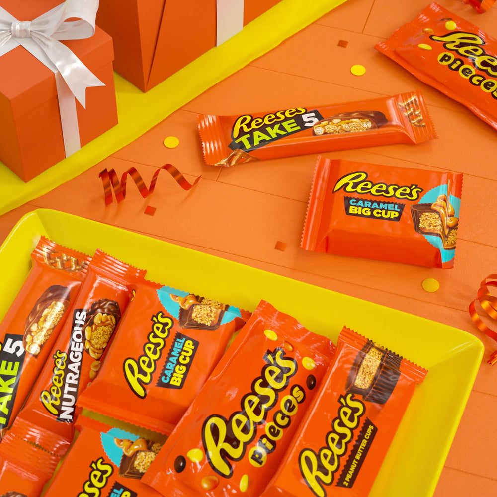 Reese's NUTRAGEOUS bar close-up of peanuts and caramel adding bold texture