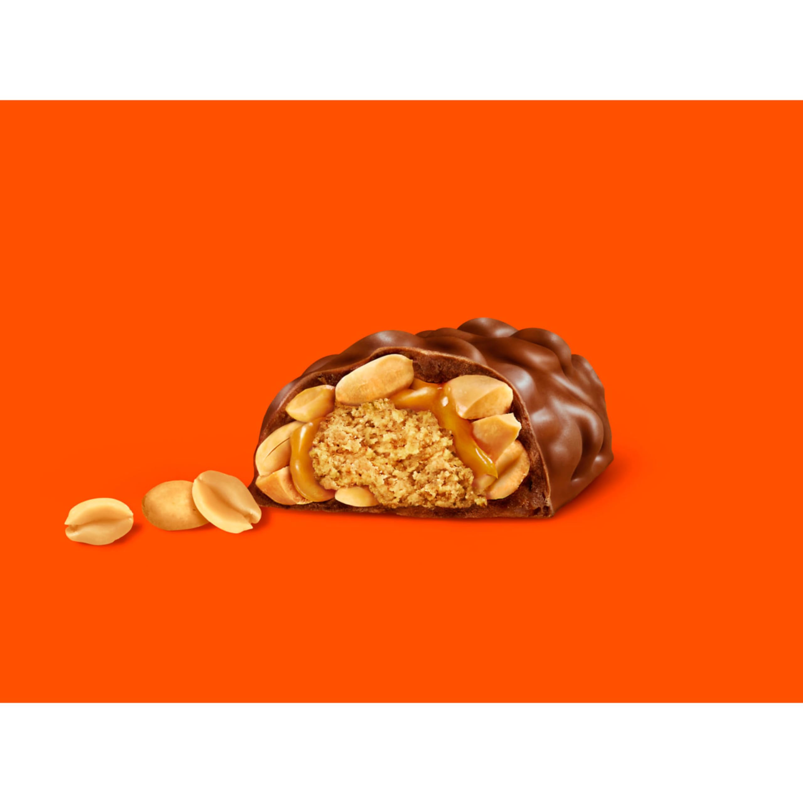 Reese's bar in hand for scale demonstrating snackable 1.66 oz size