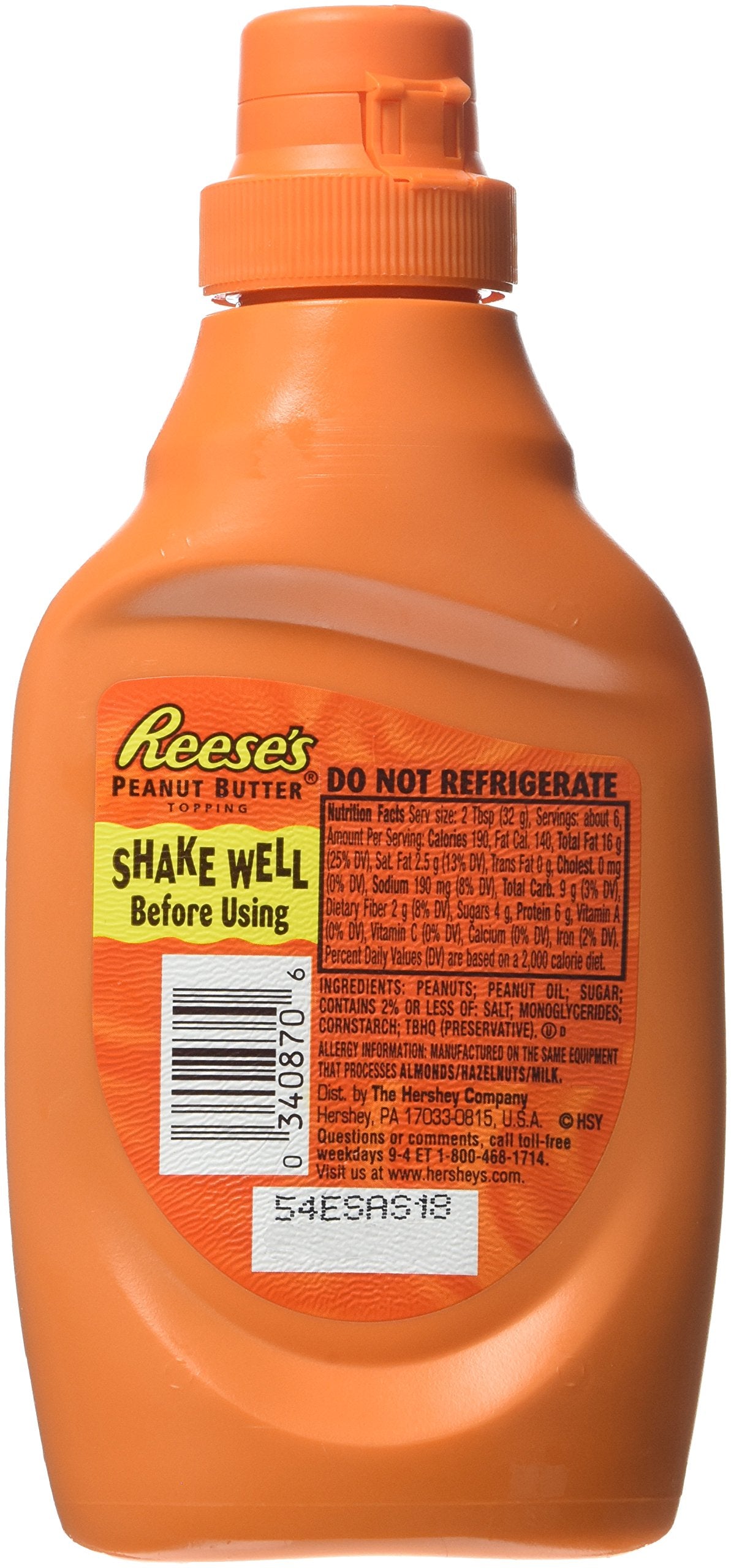 Reese's topping poured over ice cream creating creamy peanut-butter flavor and visual appeal