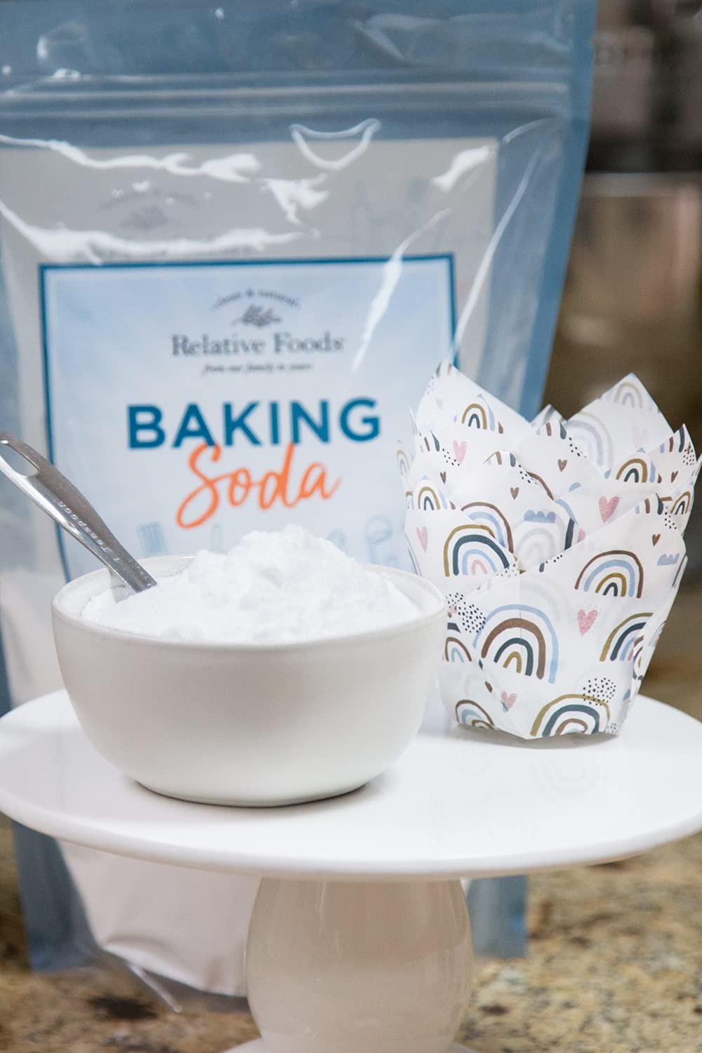 Relative Foods in kitchen baking scene with measuring spoon for portioning