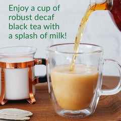 Steeped cup with a tea bag from The Republic of Tea demonstrating rich color and aroma