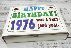 RETRO CANDY YUM gift box on a party table to inspire shared nostalgia and celebration