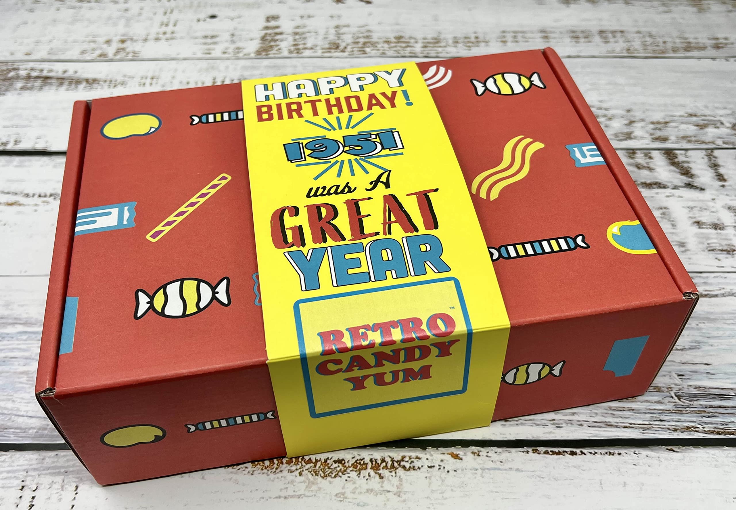 RETRO CANDY YUM box held in hand to show compact size and gifting convenience