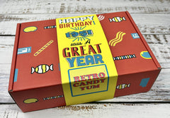 RETRO CANDY YUM box held in hand to show compact size and gifting convenience