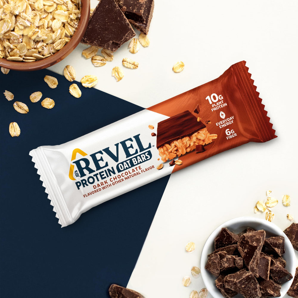 JB'S REVEL single unwrapped dark chocolate bar displaying chewy oat interior