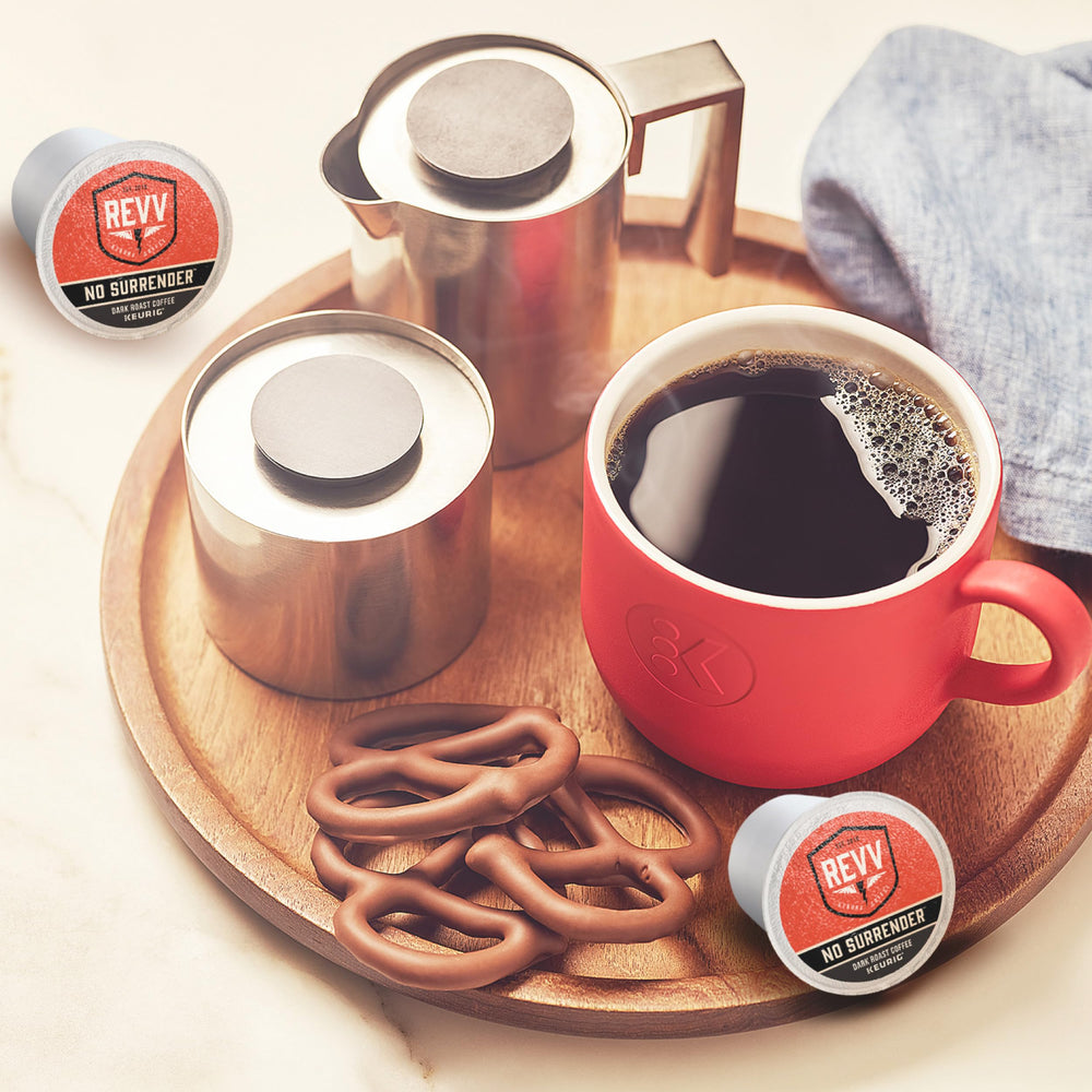 revv 48-count box beside a coffee mug to show quantity and scale