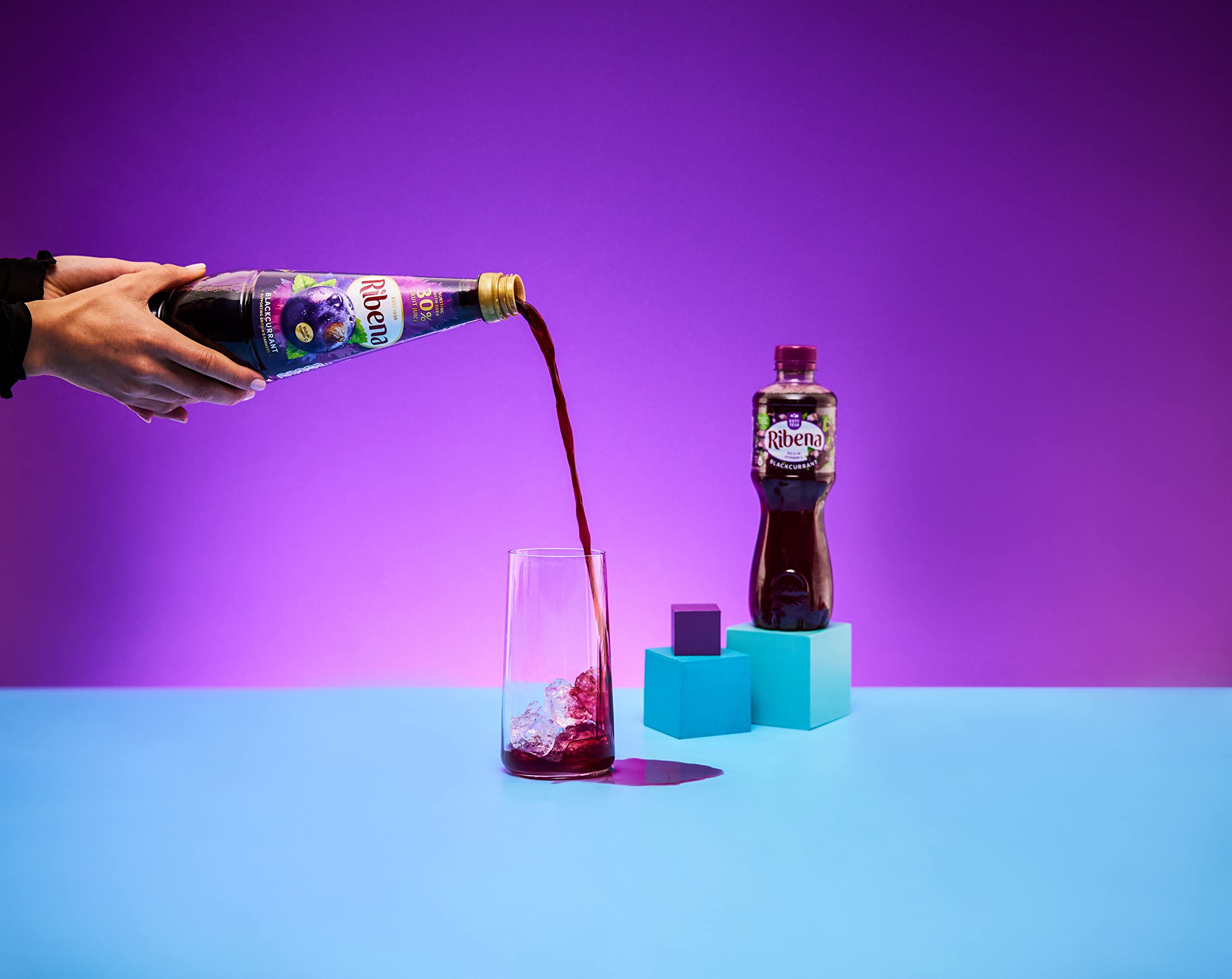 Close-up of Ribena blackcurrant syrup texture highlighting rich fruit concentration