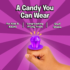 Child wearing a Ring Pop purple ring and smiling, showing fun wearable treat