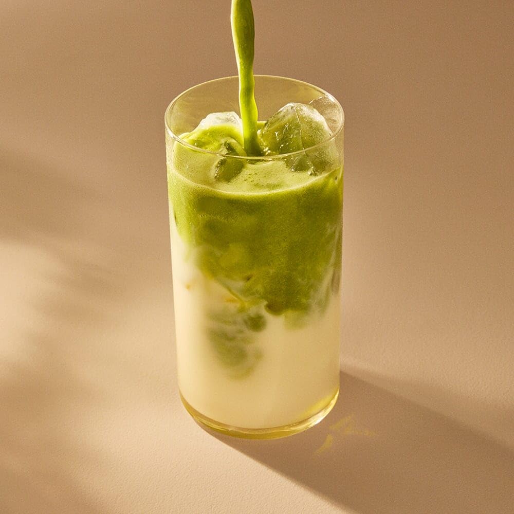 Rishi Tea whisking matcha in bowl for quick, clump-free mixing
