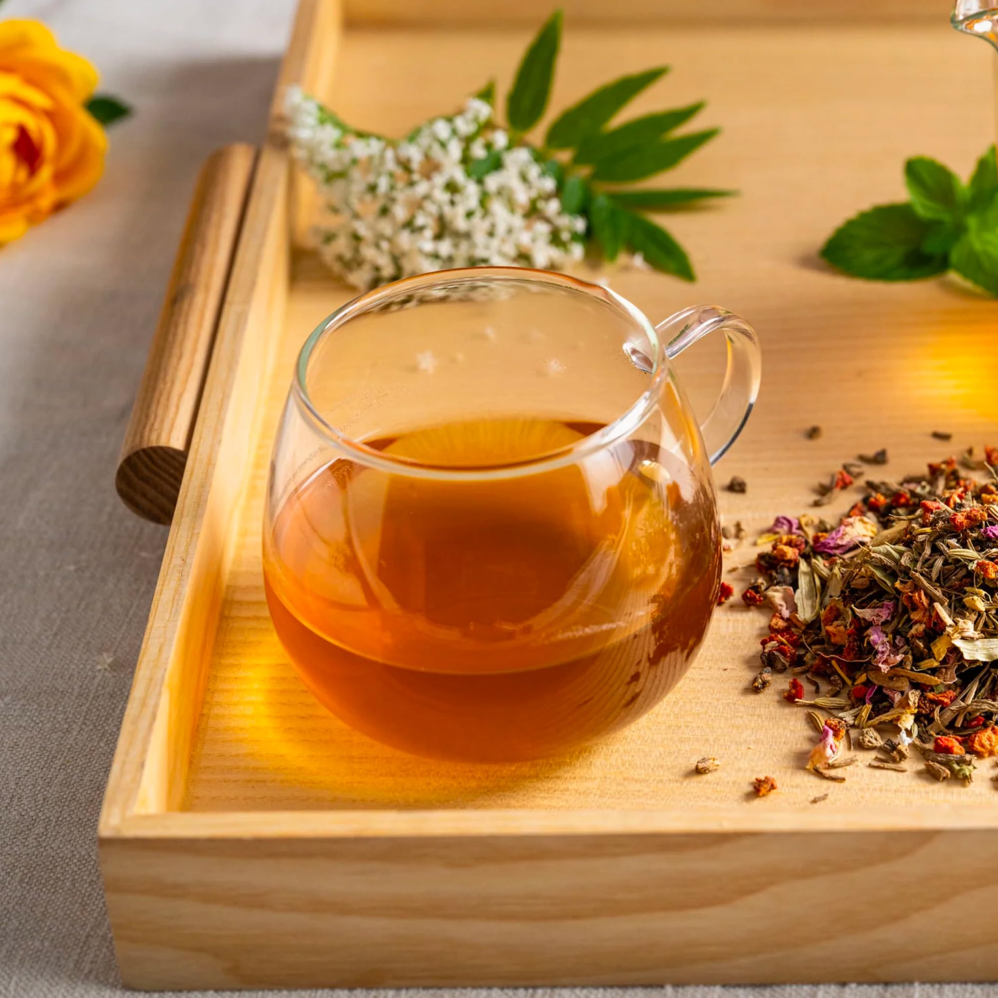 Rishi Tea evening lifestyle scene with cup by candlelight for calming nightly ritual