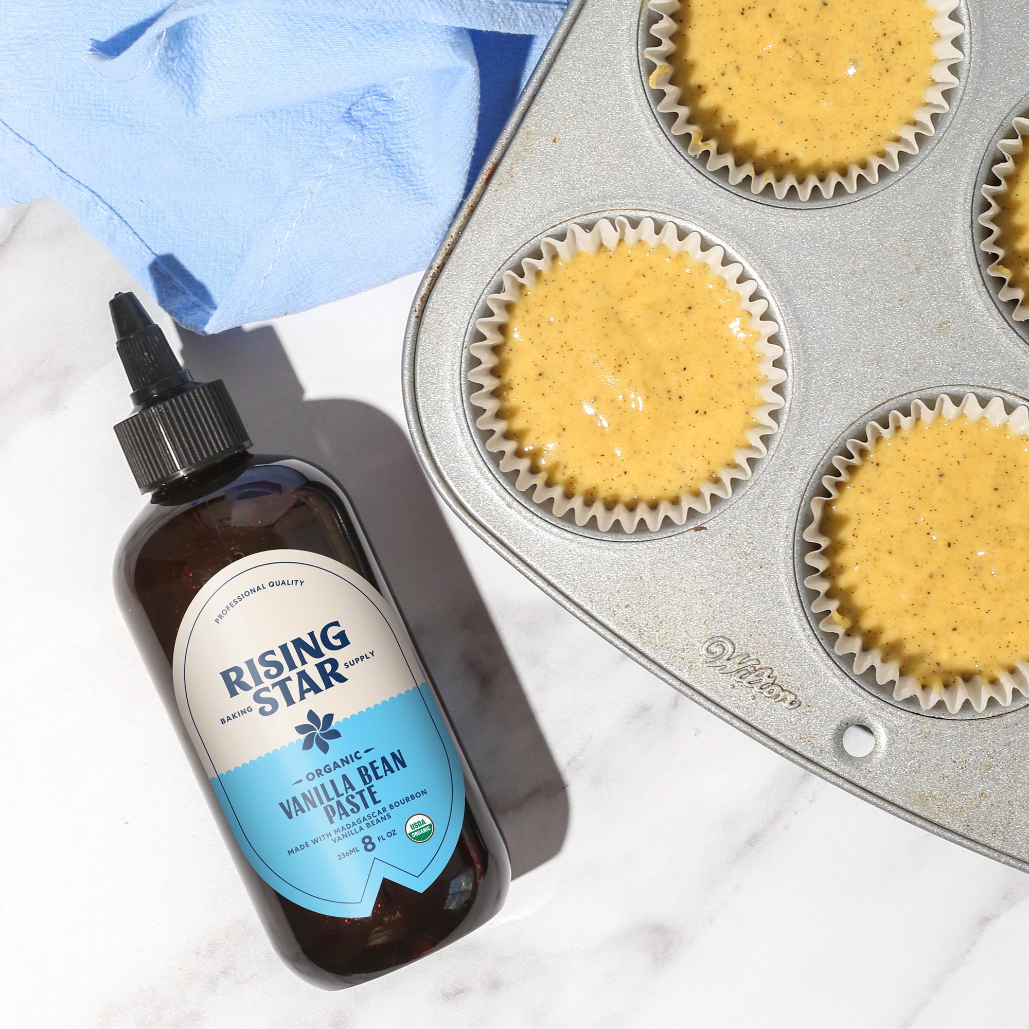 Rising Star paste drizzled over ice cream adding gourmet flavor and appearance