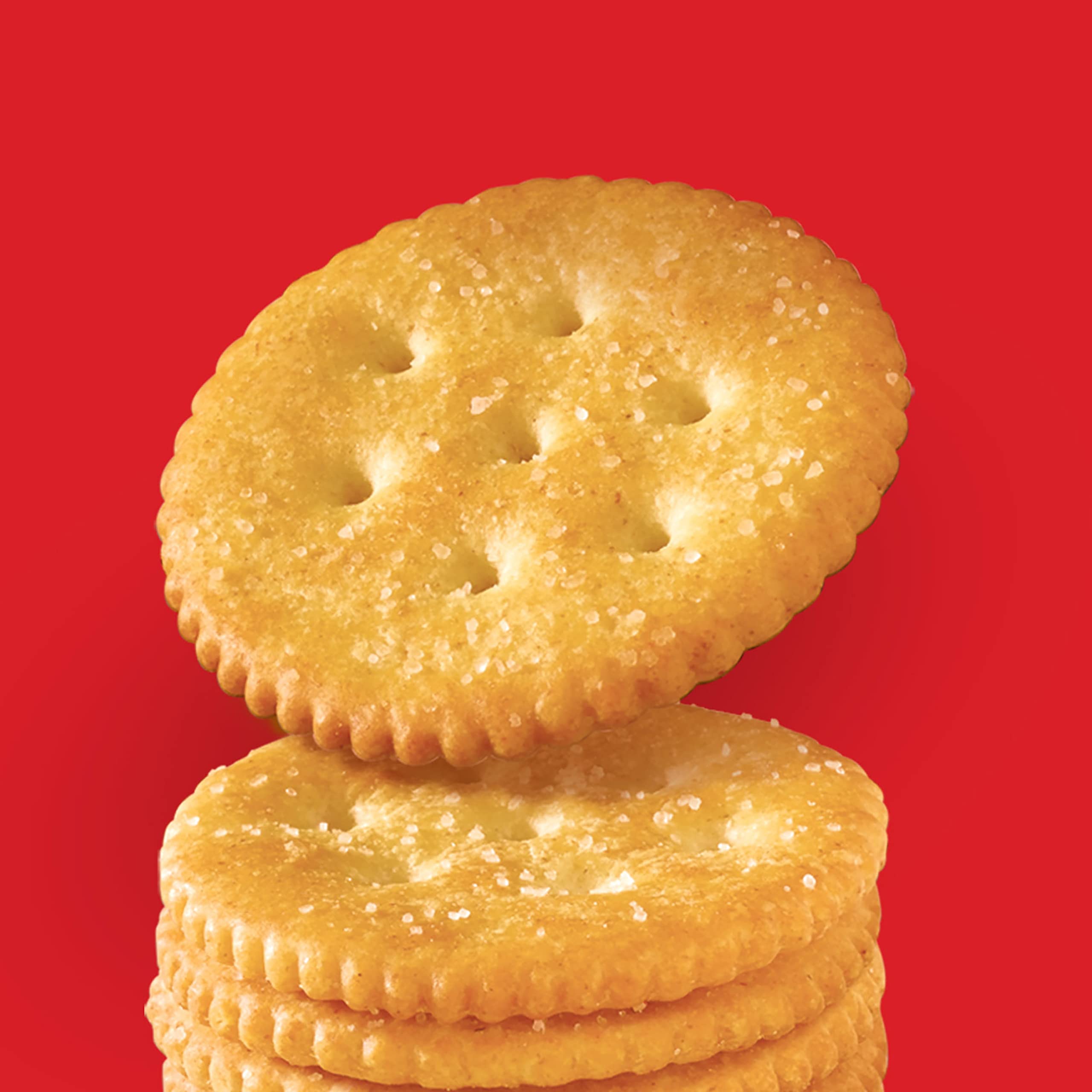 RITZ cracker close-up texture highlighting flaky buttery layers and crunch