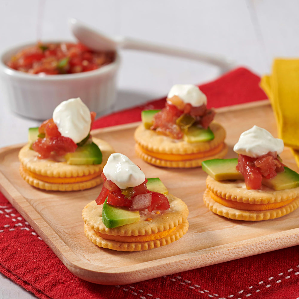 Ritz snack in a purse showing travel-ready, spill-resistant benefit