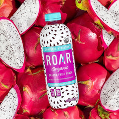 ROAR pouring dragonfruit punch into a glass for ready-to-drink hydration