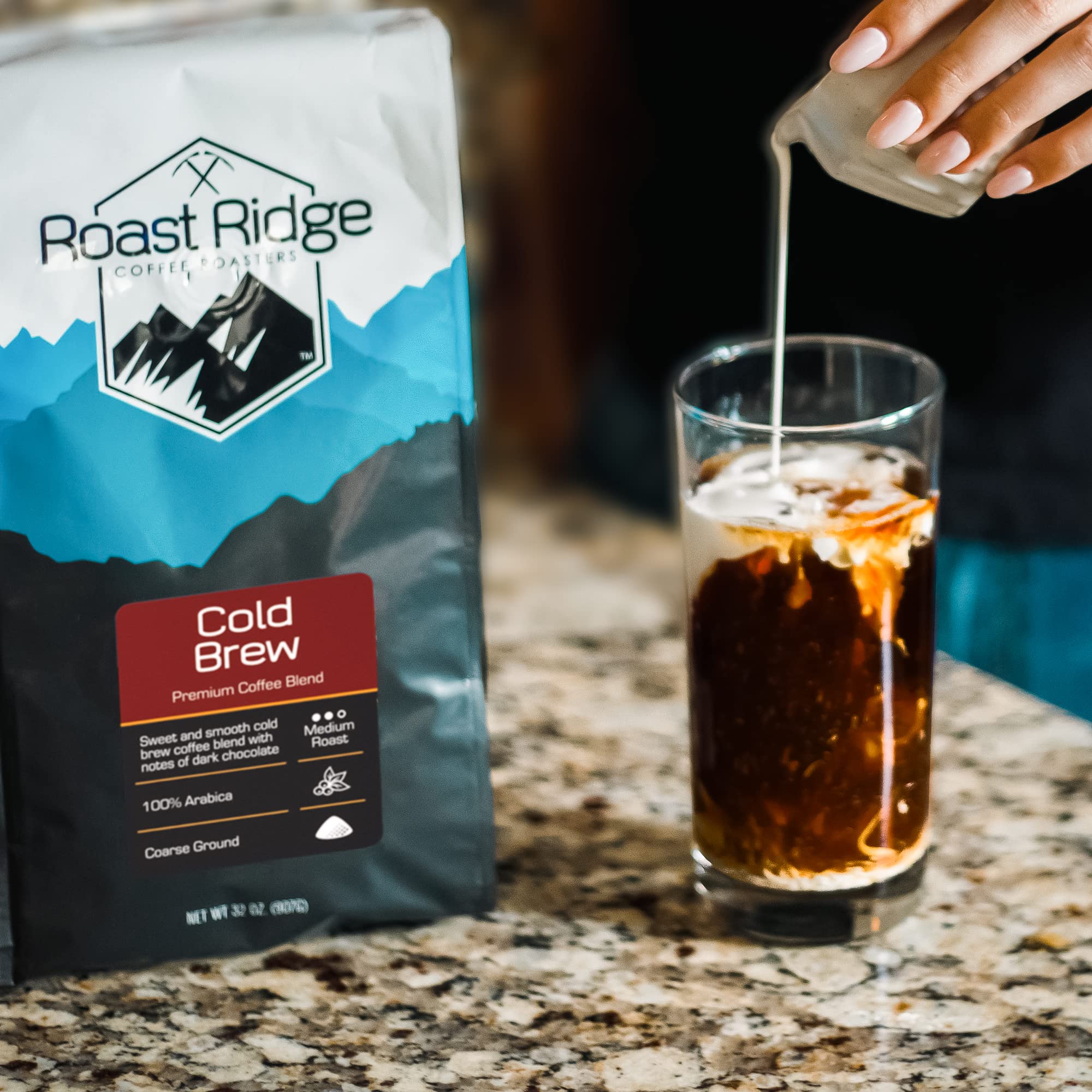 Roast Ridge cold brew pitcher in use demonstrating rich concentrate ready to pour over ice
