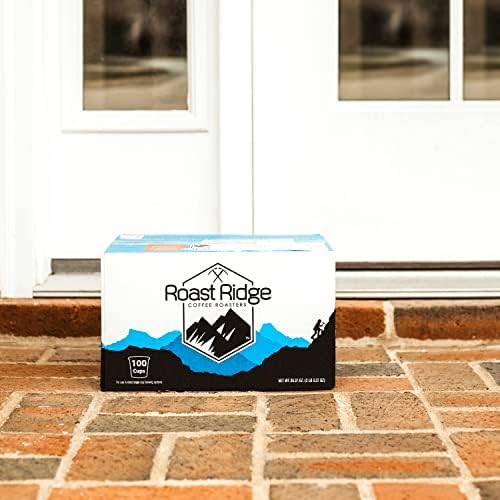 Hand holding a Roast Ridge K-Cup pod ready to brew for quick service