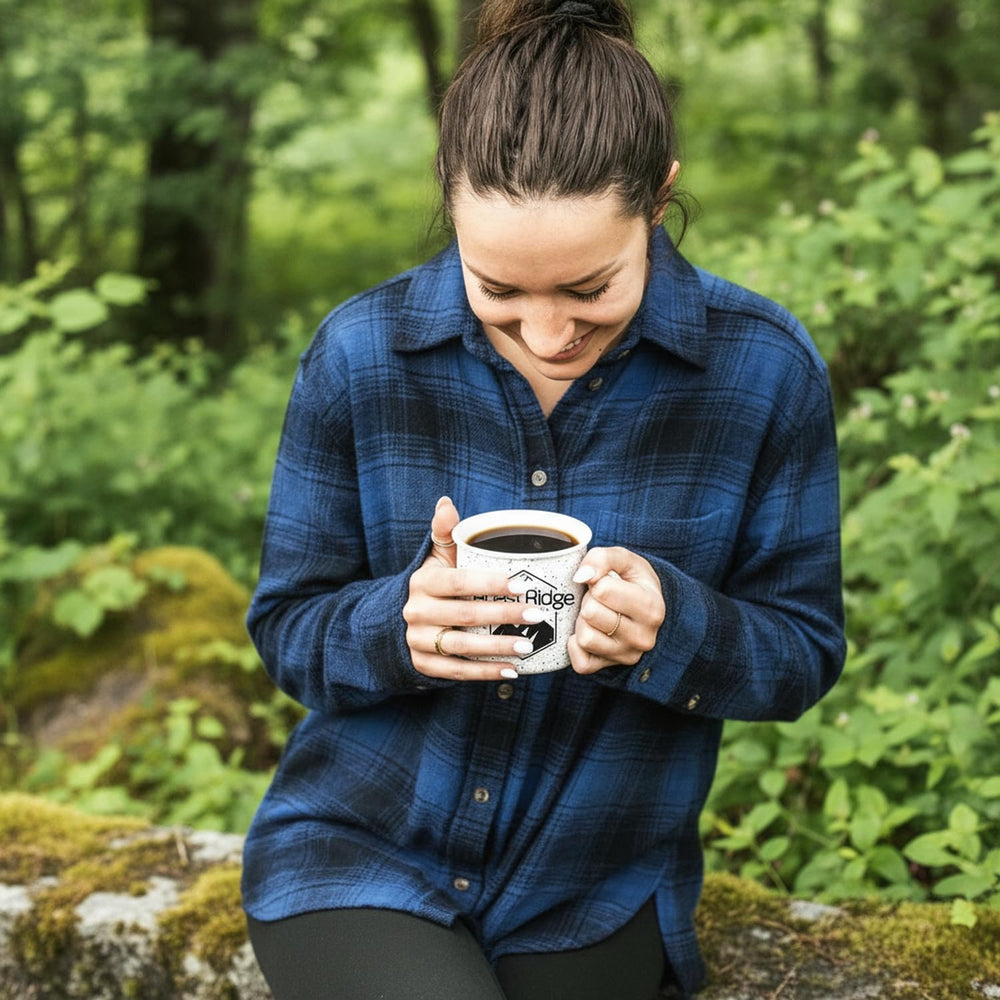 Roast Ridge pod next to coffee mug illustrating single-serve portion size and consistent brew