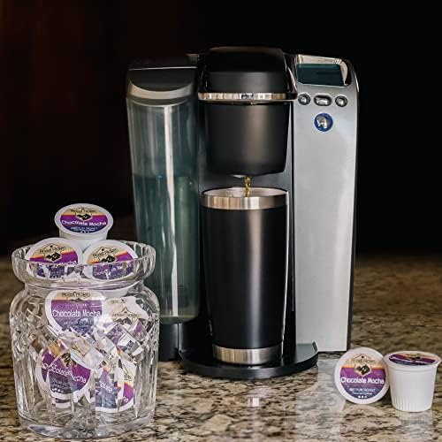 Roast Ridge cup next to K-Cup pods showing portion size and consistency