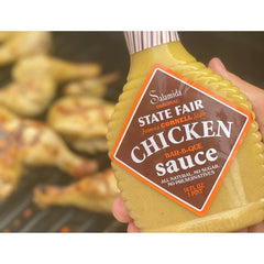 Rob Salamida pouring marinade onto raw chicken, demonstrates easy application for tenderizing