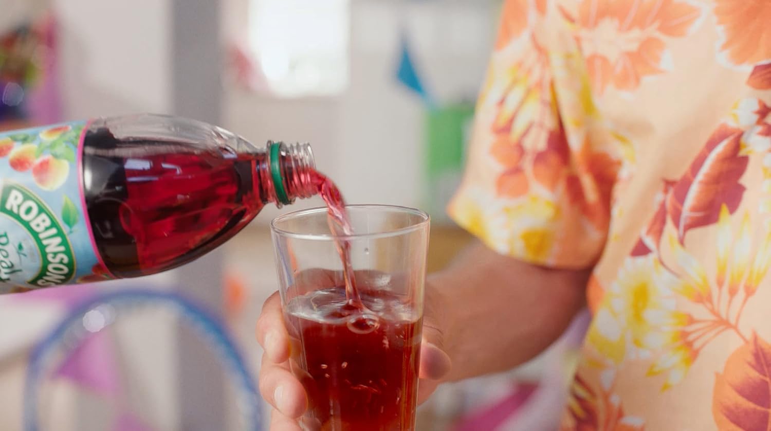 Robinsons served in a pitcher at a party, offering crowd-friendly beverage option