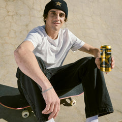Rockstar original poured into glass with foam, clear visual of taste experience