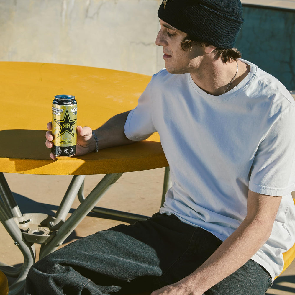 Stack of Rockstar cans emphasizing recyclability and bulk convenience benefit
