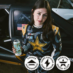 Rockstar can beside a phone showing 16 fl oz size for portion comparison