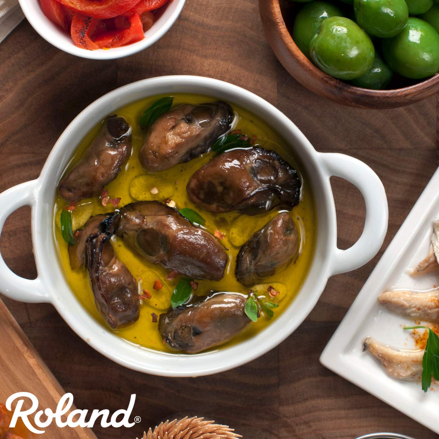 Roland Foods pack of ten tins arranged for pantry showing value and entertaining convenience