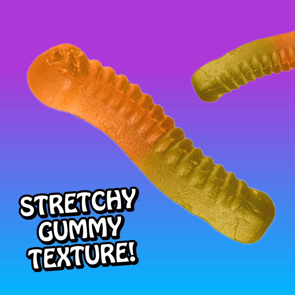 Rotten gummy worms in hand showing portion size and portability