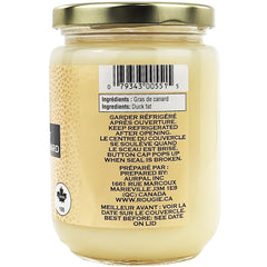 Rougie jar open with spoon of fat, showing creamy texture and easy portioning