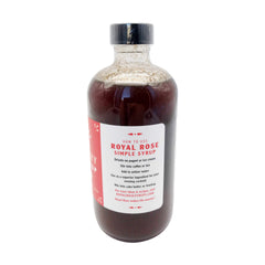 Royal Rose syrup being poured into a glass illustrating mixability benefit