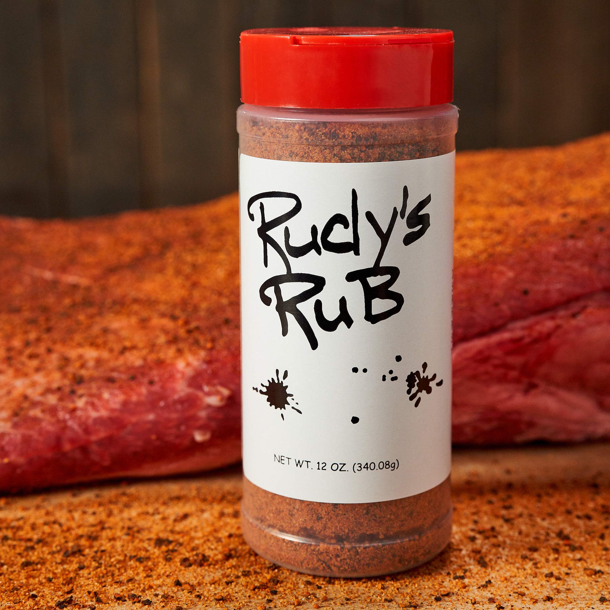 RUDY'S COUNTRY STORE AND BAR-B-Q sprinkled on brisket creating flavorful crust