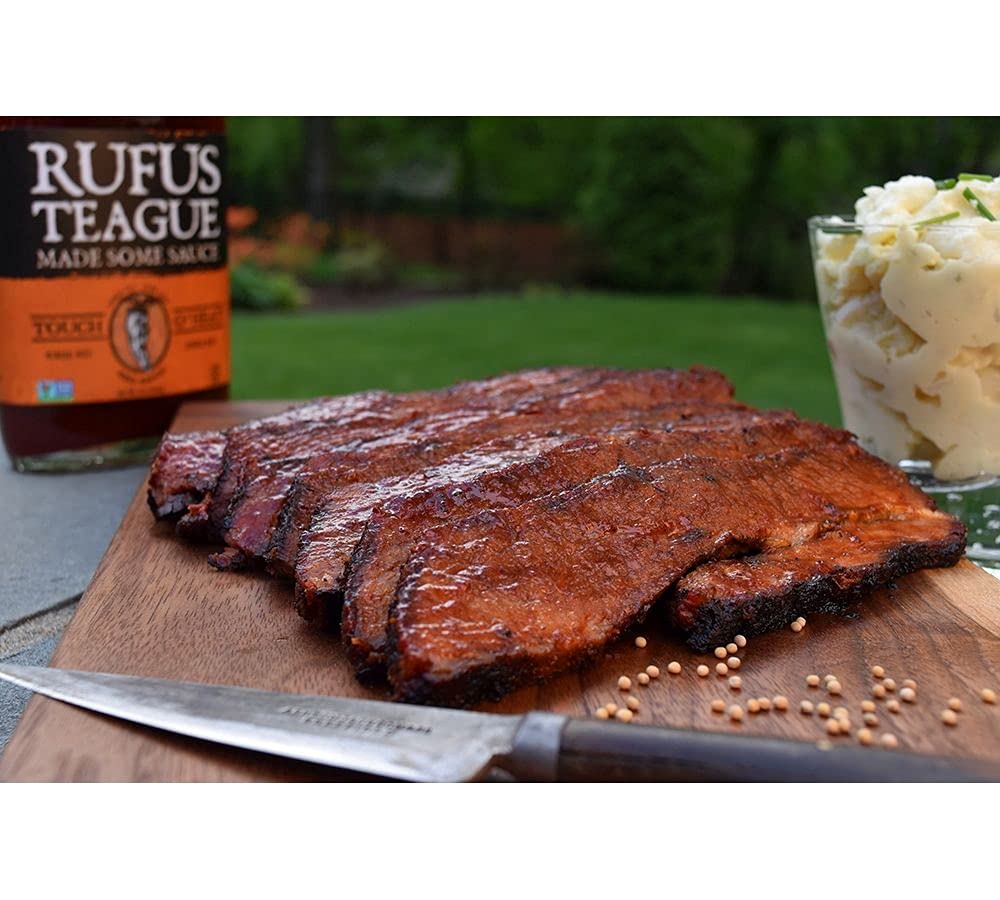 Rufus Teague bottle next to ingredients illustrating quality, gluten-free benefit